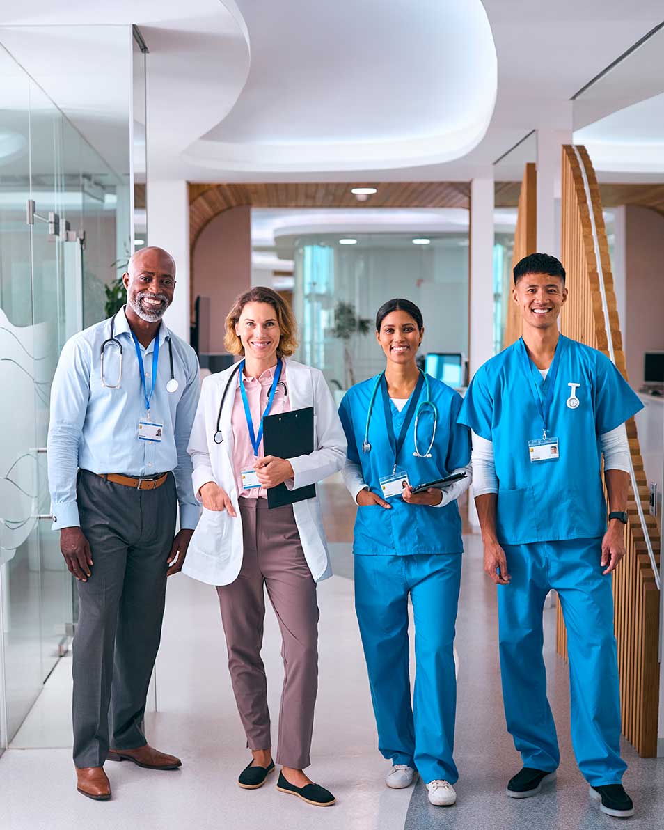 Corporate employees engaging in health and wellness services, including biometric screenings, fitness assessments, and wellness coaching at a workplace event.